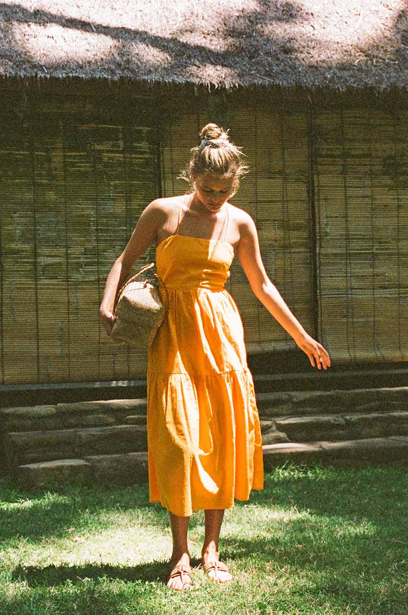 Sustainable bright orange flowy dress