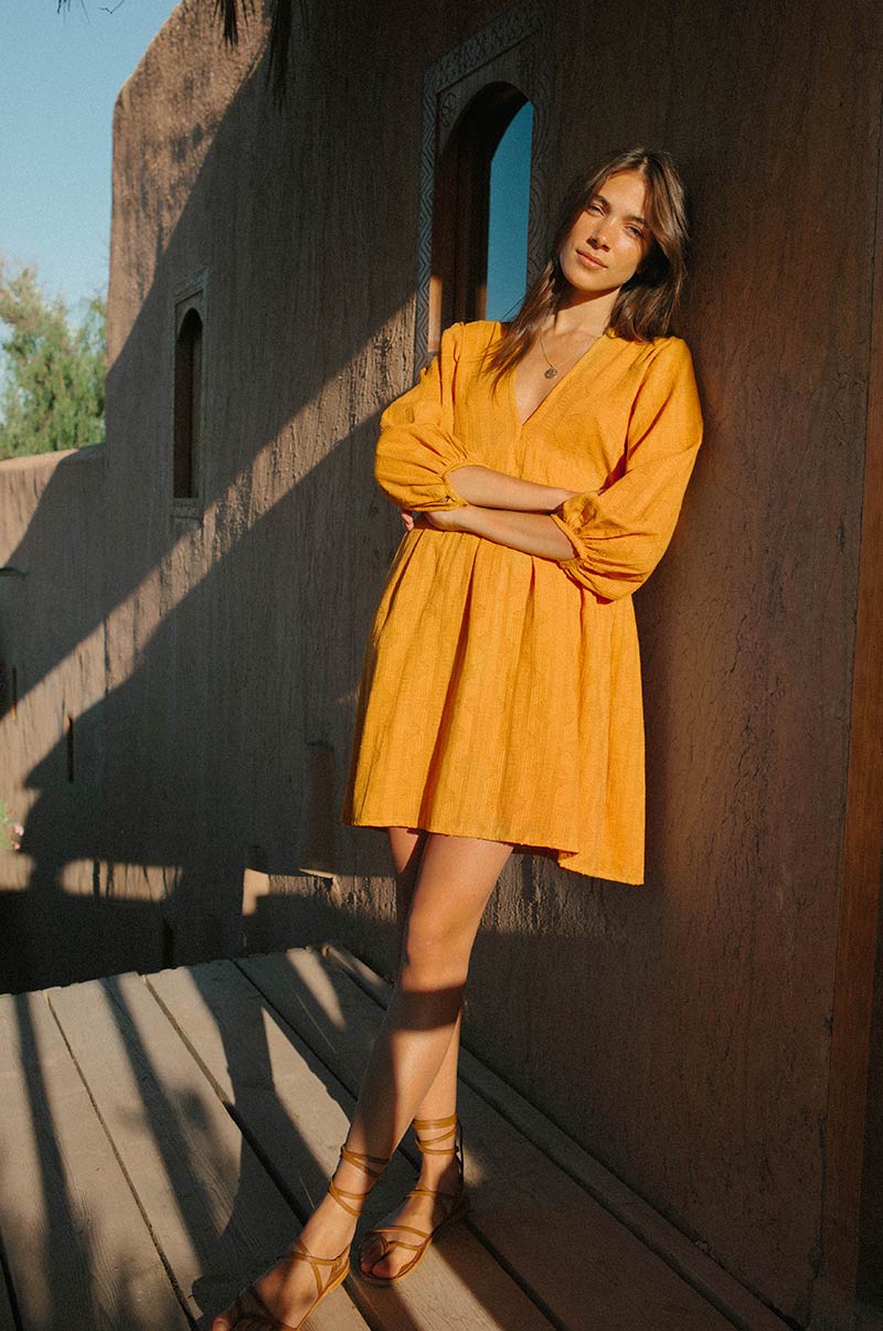 Sunshine yellow mini dress with peasant sleeves