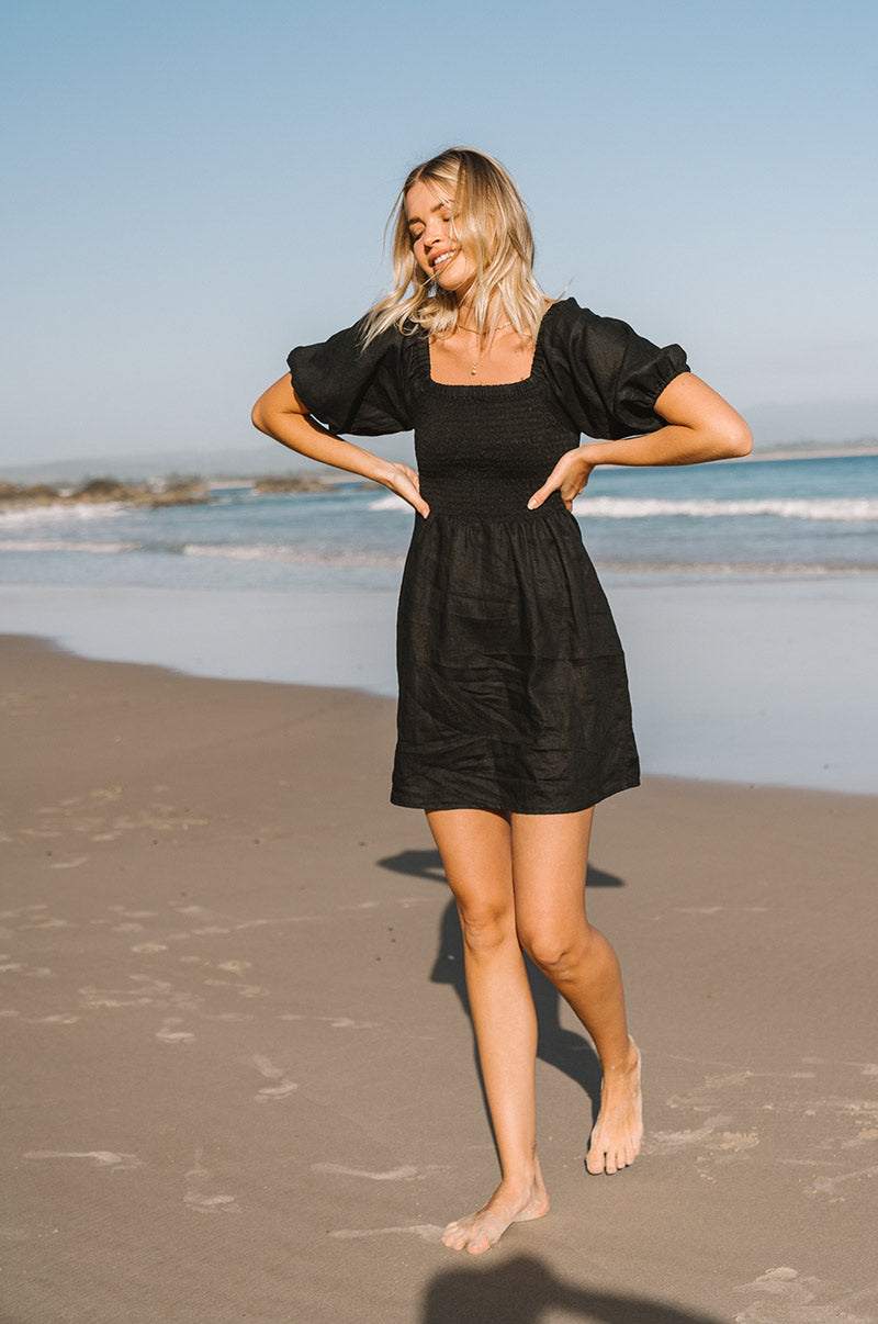 Jet-black linen mini dress - sustainable fashion